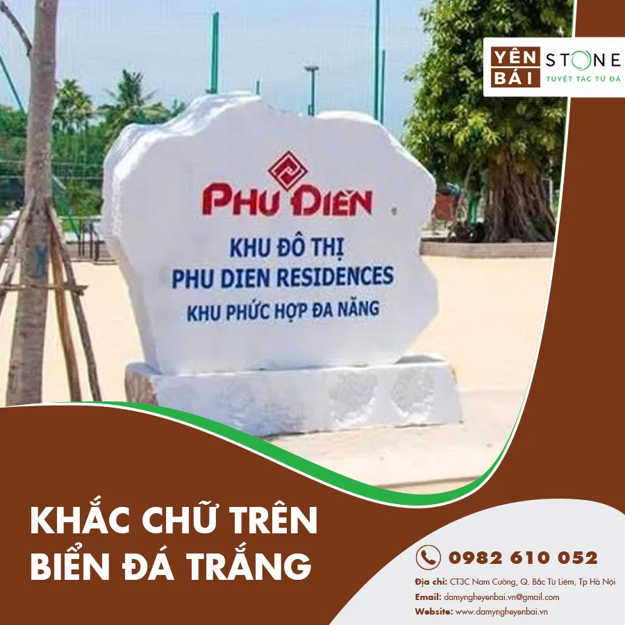 Khắc chữ trên biển đá trắng